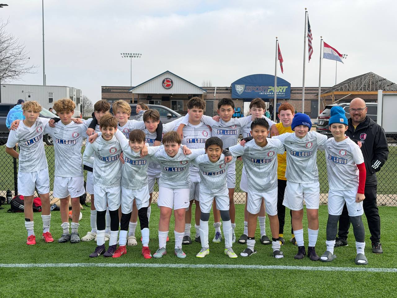 Coach with St. Louis youth soccer team at Sportport International